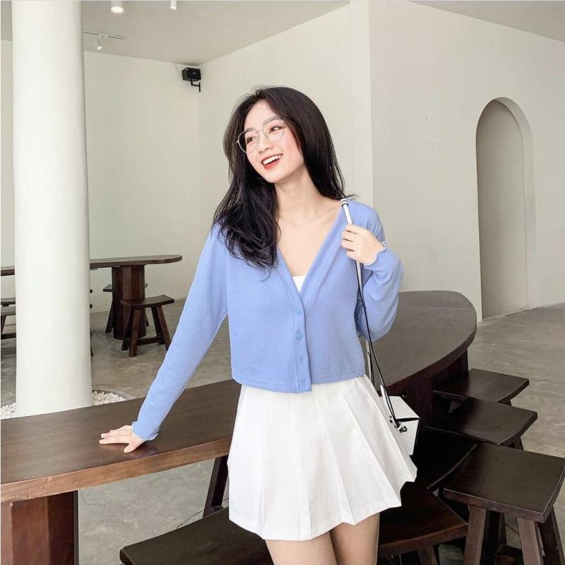 Mặc áo cardigan với chân váy xòe